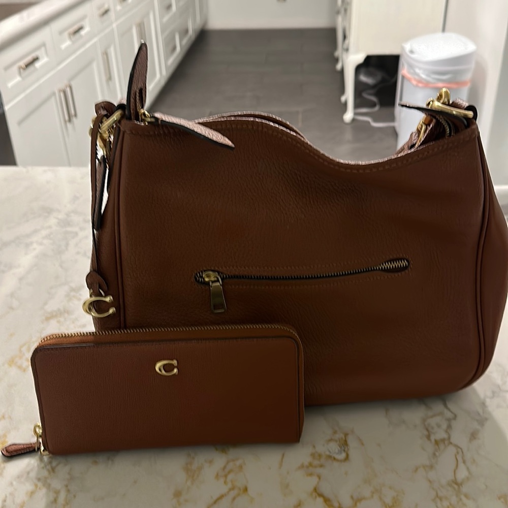 Coach Cary shoulder bag with matching wallet.